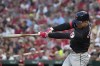 Cleveland Guardians' Andres Gimenez singles during the second inning of a baseball game against the St. Louis Cardinals Saturday, Sept. 21, 2024, in St. Louis. (AP Photo/Jeff Roberson)
