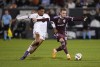 Toronto FC midfielder Kosi Thompson (47) defends against Colorado Rapids midfielder Djordje Mihailovic (10) during the first half of an MLS soccer match Saturday, Sept. 21, 2024, in Commerce City, Colo. THE CANADIAN PRESS/AP, Jack Dempsey
