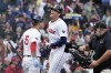 Boston Red Sox's Triston Casas, center, celebrates after his solo home run with Vaughn Grissom (5) during the fifth inning of the first game of a baseball doubleheader against the Minnesota Twins, Sunday, Sept. 22, 2024, in Boston. (AP Photo/Michael Dwyer)