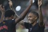 Barcelona's Raphinha celebrates with Lamine Yamal after scoring his side's 5th goal against Villarreal during a Spanish La Liga soccer match at the La Cerámica stadium in Villarreal, Spain, Sunday, Sept. 22, 2024. (AP Photo/Alberto Saiz)