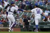 Chicago Cubs starting pitcher Shota Imanaga, right, of Japan, is congratulated by catcher Miguel Amaya, left, as they walk to the dugout after the second inning of a baseball game against the Washington Nationals in Chicago, Sunday, Sept. 22, 2024. (AP Photo/Nam Y. Huh)