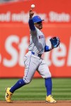 New York Mets' Francisco Lindor throws to first base for an out on a ball hit by Philadelphia Phillies' Trea Turner during the first inning of a baseball game, Sunday, Sept. 15, 2024, in Philadelphia. (AP Photo/Derik Hamilton)