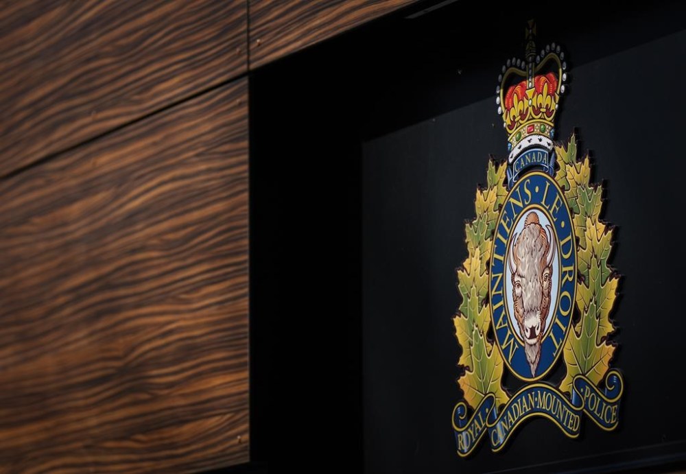 Mounties say they continue to investigate the death of a boy who had been reported missing from his school in northeastern Manitoba. The RCMP logo is seen in Surrey, B.C., on Thursday, March 16, 2023. THE CANADIAN PRESS/Darryl Dyck