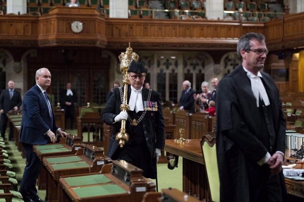A federal inquiry into foreign interference is slated to hear today from parliamentary security officials including House of Commons sergeant-at-arms Patrick McDonell. McDonell carries the mace out of the House of Commons Chamber after the house rises, on Parliament Hill in Ottawa on Thursday, Dec. 13, 2018. THE CANADIAN PRESS/Justin Tang