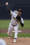 San Diego Padres starting pitcher Dylan Cease works against a Houston Astros batter during the first inning of a baseball game Wednesday, Sept. 18, 2024, in San Diego. (AP Photo/Gregory Bull)