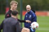 Manchester United manager Erik ten Hag, right, leads a training session at the Carrington Training Complex, Manchester, England, Tuesday Sept. 24, 2024. (Martin Rickett/PA via AP)