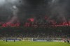 AC Milan's fans lit flares after Christian Pulisic scored the opening goal during the Serie A soccer match between Inter Milan and AC Milan at the San Siro stadium in Milan, Italy, Sunday, Sept.22, 2024. (AP Photo/Luca Bruno)