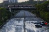 The Insurance Bureau of Canada estimates over seven billion dollars in insured losses following four catastrophic weather events this summer. Cars remain stranded on the Don Valley Parkway as water recedes following heavy rain that caused flooding in Toronto on Tuesday, July 16, 2024. THE CANADIAN PRESS/Christopher Katsarov