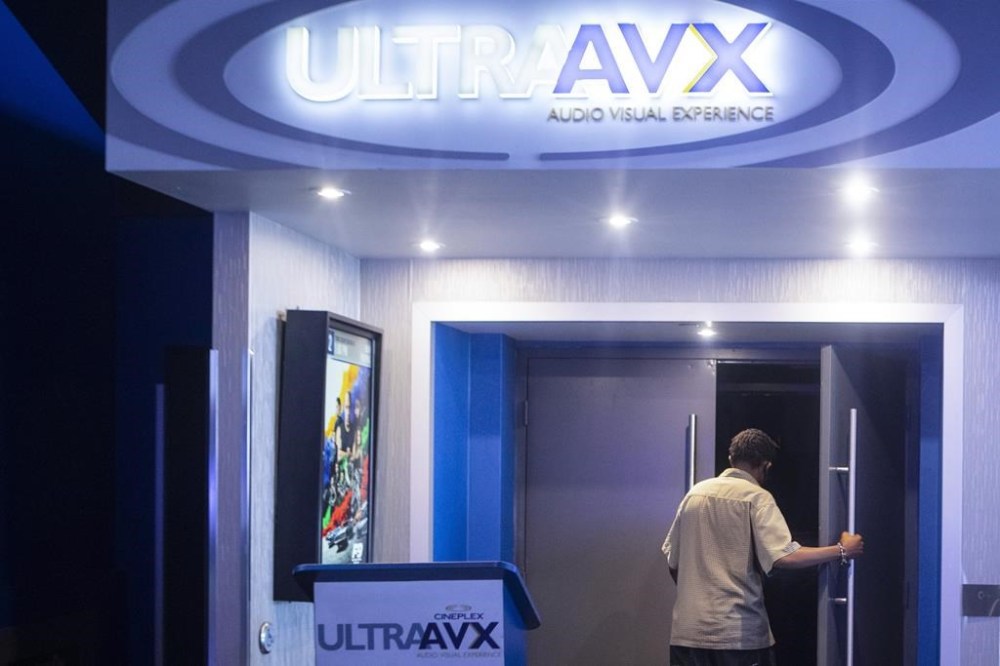 At least one competition expert says a record $38.9 million fine Cineplex Inc. has been ordered to pay is bound to encourage even more action against companies engaged in a deceptive practice known as drip pricing. A moviegoer steps into an auditorium at a Cineplex Movie Theatre in Toronto on Friday, July 16, 2021.THE CANADIAN PRESS/Chris Young