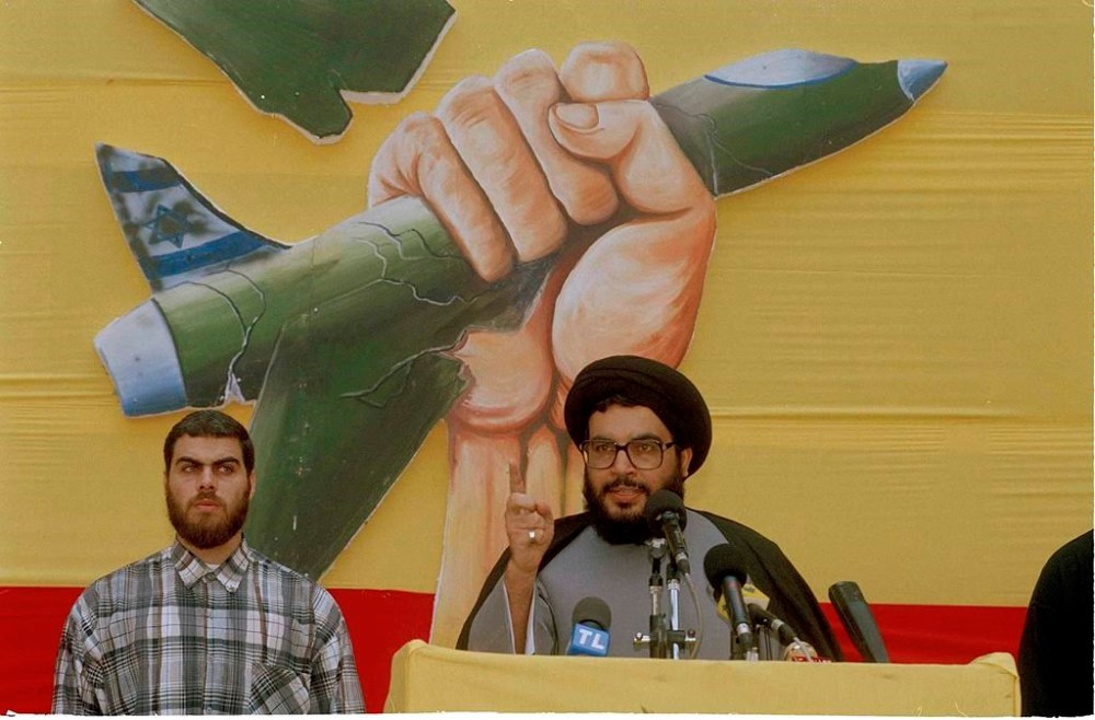 FILE - Hassan Nasrallah, leader of Hezbollah, speaks during a ceremony in Beirut on July 24, 1994, marking the first anniversary of the weeklong Israeli blitz on south Lebanon. (AP Photo/Ahmed Azakir, File)