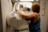 The Manitoba government is expected to lower the age for breast cancer screenings beginning next year. In this May 22, 2015 photo, A woman receives a mammogram at the University of Michigan Cancer Center in Ann Arbor, Mich. on May 22, 2015. THE CANADIAN PRESS/AP-Kimberly P. Mitchell/Detroit Free Press via AP, File
