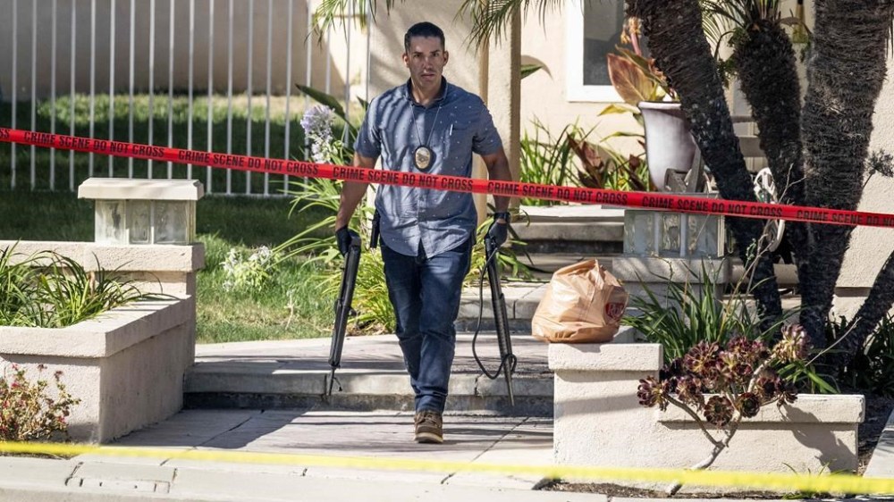 FILE - Investigators remove firearms from Judge Jeffrey Ferguson's residence in Anaheim, Calif., on Aug. 4, 2023. (Paul Bersebach/The Orange County Register via AP, File)