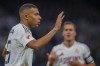 Real Madrid's Kylian Mbappe celebrates after scoring his side's second goal during a Spanish La Liga soccer match between Real Madrid and Alaves at Santiago Bernabeu stadium in Madrid, Spain, Tuesday, Sept. 24, 2024. (AP Photo/Manu Fernandez)