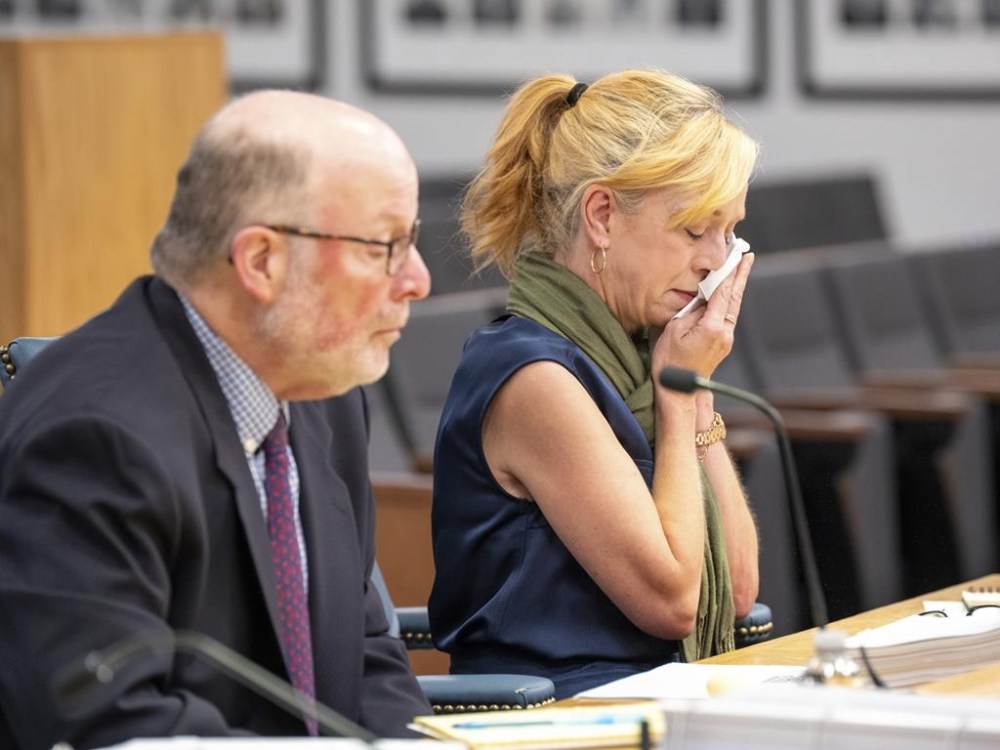 Amber Bay, Former OceanGate Director of Administration breaks down into tears while giving a final statement at the Titan marine board of investigation hearing inside the Charleston County Council Chambers Tuesday, Sept. 24, 2024, in North Charleston, S.C. (Corey Connor via AP, Pool)
