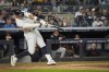 New York Yankees' Aaron Judge hits a home run during the fourth inning of a baseball game against the Baltimore Orioles, Tuesday, Sept. 24, 2024, in New York. (AP Photo/Bryan Woolston)