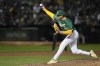 Oakland Athletics pitcher Mason Miller throws to a Texas Rangers batter during the ninth inning of a baseball game Tuesday, Sept. 24, 2024, in Oakland, Calif. (AP Photo/Godofredo A. Vásquez)