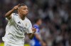 Real Madrid's Kylian Mbappe celebrates after scoring his side's second goal during a Spanish La Liga soccer match between Real Madrid and Alaves at Santiago Bernabeu stadium in Madrid, Spain, Tuesday, Sept. 24, 2024. (AP Photo/Manu Fernandez)