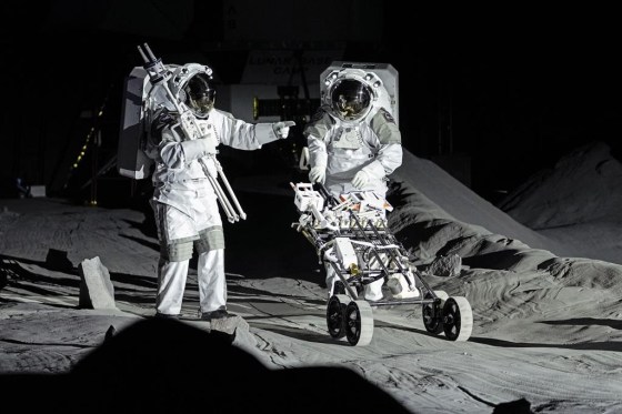 Astronauts Thomas Pesquet of France and Matthias Maurer of Germany demonstrate their training in lunar surface at the new LUNA facility at the European Astronaut Center in Cologne, Germany. (Martin Meissner / The Associated Press files)