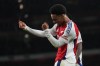 Arsenal's Ethan Nwaneri celebrates after scored his side's the second goal during the English League Cup third round soccer match between Arsenal and Bolton Wanderers at the Emirates stadium in London, Wednesday, Sept. 25, 2024. (AP Photo/Kirsty Wigglesworth)
