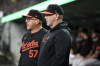 Baltimore Orioles manager Brandon Hyde, right, and bench coach Fredi González watch from the dugout in the sixth inning of a baseball game against the Detroit Tigers, Saturday, Sept. 14, 2024, in Detroit. (AP Photo/Jose Juarez)