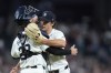 Detroit Tigers pitcher Jackson Jobe hugs catcher Dillon Dingler after making his major league debut to close out the ninth inning of a baseball game against the Tampa Bay Rays, Wednesday, Sept. 25, 2024, in Detroit. (AP Photo/Carlos Osorio)