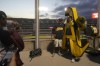 Oakland Athletics fan Cody Maibes, right, poses for photos with other fans during a baseball game between the Athletics and the Texas Rangers in Oakland, Calif., Wednesday, Sept. 25, 2024. (AP Photo/Jeff Chiu)