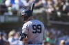 New York Yankees' Aaron Judge waits to bat during the seventh inning of a baseball game against the Oakland Athletics in Oakland, Calif., Sunday, Sept. 22, 2024. (AP Photo/Nic Coury)
