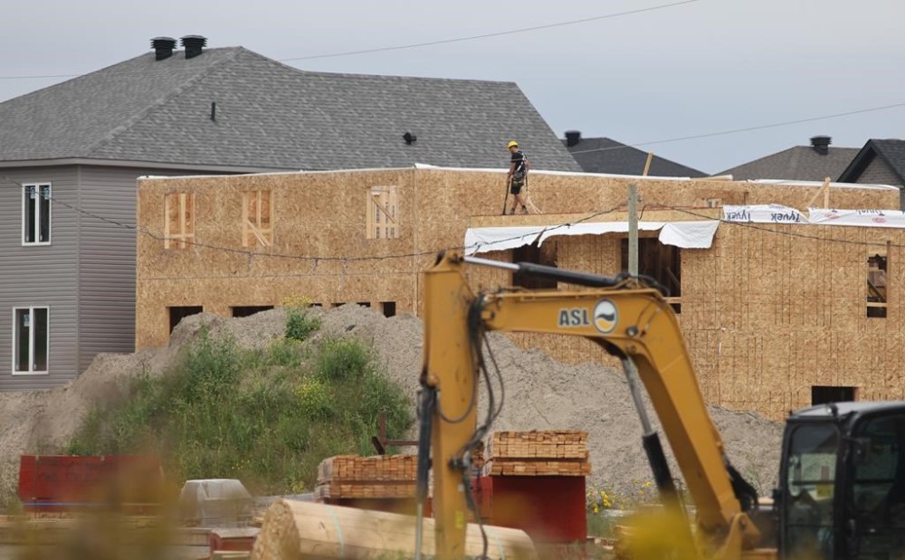 The Canada Mortgage and Housing Corp. says construction of new homes in Canada's six largest cities rose four per cent year-over-year in the first half of 2024, but housing start levels were still not enough to meet growing demand. New home construction is seen in the Barrhaven neighbourhood of Ottawa on Friday, Aug. 30, 2024. THE CANADIAN PRESS/ Patrick Doyle