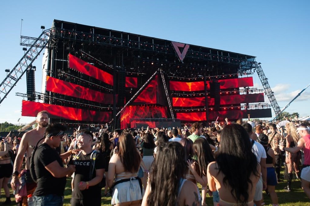 Live Nation says it will build an open-air music venue at Toronto's Downsview Park with a capacity of 50,000. Electronic music fans attend the 2022 Veld Music Festival in Downsview Park in Toronto, July 30, 2022. THE CANADIAN PRESS/Eduardo Lima