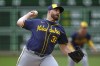 Milwaukee Brewers starting pitcher Aaron Civale delivers during the second inning of a baseball game against the Pittsburgh Pirates in Pittsburgh, Thursday, Sept. 26, 2024. (AP Photo/Gene J. Puskar)