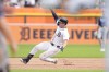 Detroit Tigers' Colt Keith slides for a RBI triple during the sixth inning of a baseball game against the Tampa Bay Rays, Thursday, Sept. 26, 2024, in Detroit. (AP Photo/Carlos Osorio)