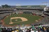 Fans attend a baseball game between the Oakland Athletics and the Texas Rangers, Thursday, Sept. 26, 2024, in Oakland, Calif. (AP Photo/Benjamin Fanjoy)
