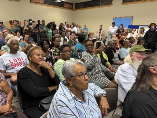 Residents of St. Rose, La., packed a small public library room for a public hearing on Thursday, Sept. 26, 2024, on the proposed St. Charles Clean Fuels ammonia production facility which has faced growing opposition in St. Charles Parish, La. (AP Photo/Jack Brook)