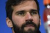 Liverpool's goalkeeper Alisson Becker attends a news conference at the San Siro Stadium, in Milan, Italy, Monday, Sept.16, 2024, ahead of Champions League soccer match between A.C. Milan and Liverpool on Tuesday. (AP Photo/Luca Bruno)