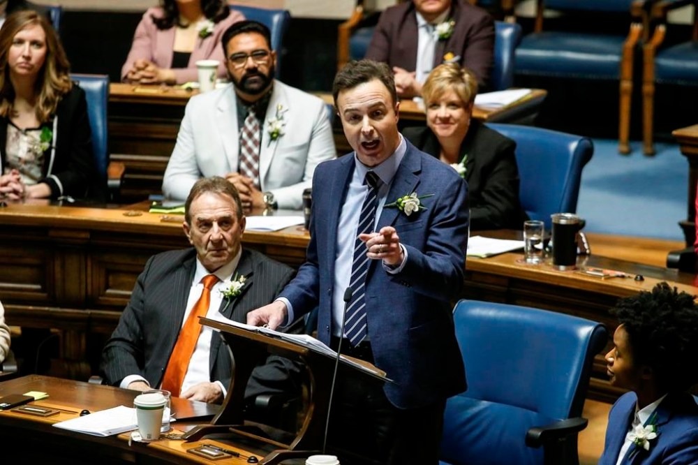 New documents show the Manitoba government posted a deficit of just under $2 billion -- the largest non-pandemic deficit in the province's history in the fiscal year that ended in March. Manitoba Finance Minister Adrien Sala delivers the provincial budget in the Manitoba Legislature in Winnipeg, Tuesday, April 2, 2024. THE CANADIAN PRESS/John Woods