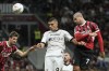 AC Milan's Alvaro Morata scores a header during the Serie A soccer match between AC Milan and Lecce at the San Siro stadium in Milan, Italy, Friday, Sept. 27, 2024. (AP Photo/Antonio Calanni)