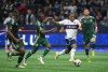 Vancouver Whitecaps' Levonte Johnson, front right, and Portland Timbers' Diego Chara vie for the ball during the second half of an MLS soccer match, in Vancouver, on Saturday, March 30, 2024. Another week, another critical game for the Vancouver Whitecaps.THE CANADIAN PRESS/Darryl Dyck