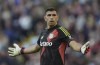 Aston Villa goalkeeper Emiliano Martinez reacts after receiving a yellow card during the British Premier League soccer match between Aston Villa and Everton, Villa Park, Birmingham, England, Saturday Sept. 14, 2024. (Jacob King/PA via AP)