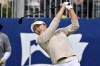 Haeran Ryu, of South Korea, watches her shot off the first tee during the first round of the LPGA Walmart NW Arkansas Championship golf tournament, Friday, Sept. 27, 2024, in Rogers, Ark. (AP Photo/Michael Woods)