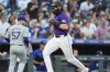 Colorado Rockies' Charlie Blackmon scores on a triple hit by Ezequiel Tovar off Los Angeles Dodgers starting pitcher Ryan Brasier in the first inning of a baseball game, Friday, Sept. 27, 2024, in Denver. (AP Photo/David Zalubowski)