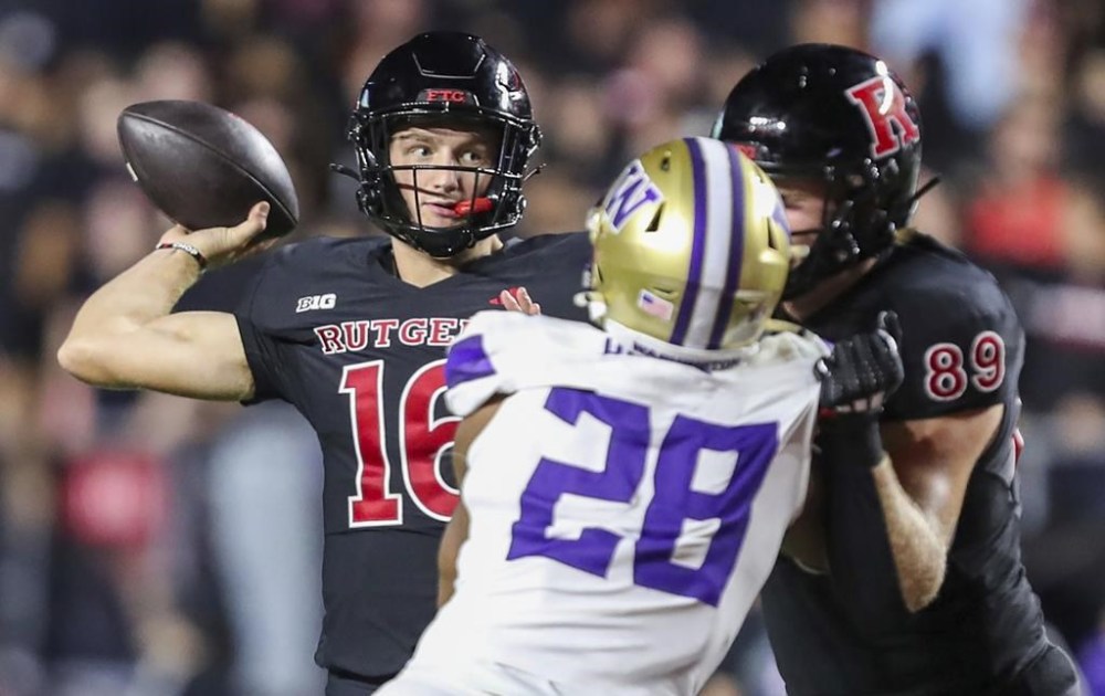 Rutgers quarterback Athan Kaliakmanis (16) throws a pass during the first half of an NCAA football game against Washington, Friday, Sept. 27 2024, in Piscataway, N.J. (Andrew Mills/NJ Advance Media via AP)