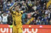 Inter Milan's Lautaro Martinez celebrates after scoring during the Serie A soccer match between Udinese and Inter, at the Bluenergy Stadium in Udine, Italy, Saturday, Sept. 28, 2024. (Andrea Bressanutti/LaPresse via AP)