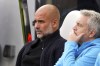 Manchester City manager Pep Guardiola looks on at the start of the Premier League match between Newcastle and Manchester City, at St James' Park, Newcastle upon Tyne, England, Saturday Sept. 28, 2024. (Owen Humphreys/PA via AP)