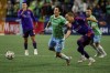 Houston Dynamo midfielder Griffin Dorsey clips Seattle Sounders FC midfielder Paul Rothrock to pick up a yellow card during the first half Saturday, Sept. 28, 2024 in Seattle. (Jennifer Buchanan/The Seattle Times via AP)