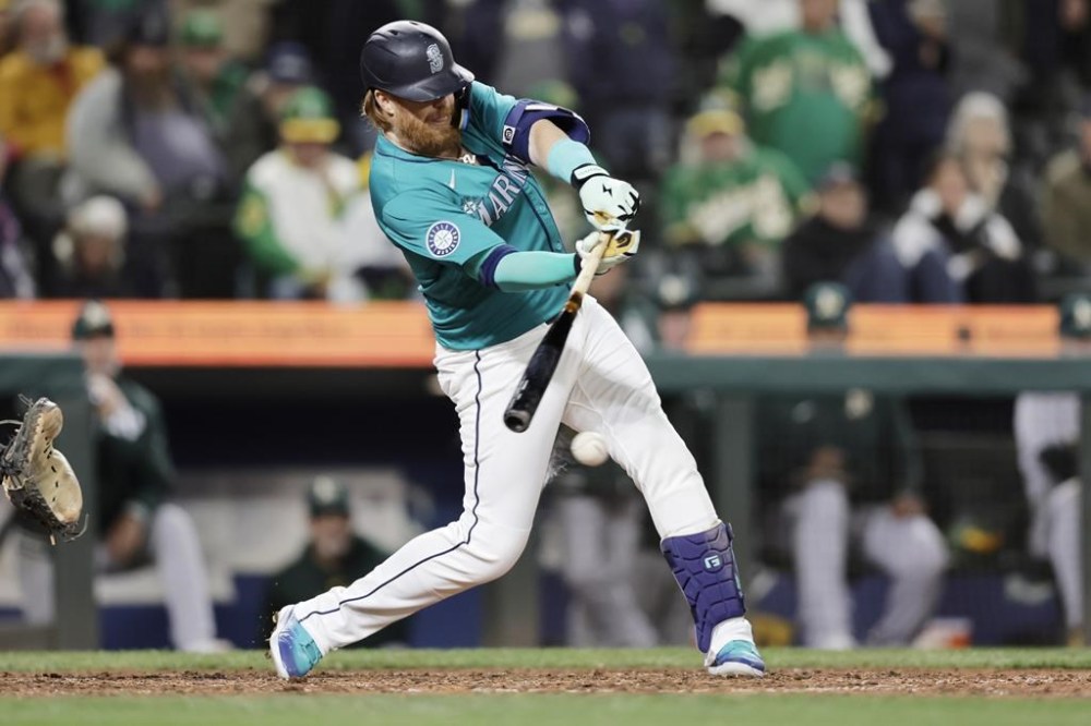 Raley rallies Mariners twice, Raleigh homers in 76 win over A’s in 10