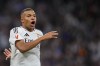 Real Madrid's Kylian Mbappe celebrates after scoring his side's second goal during a Spanish La Liga soccer match between Real Madrid and Alaves at Santiago Bernabeu stadium in Madrid, Spain, Tuesday, Sept. 24, 2024. (AP Photo/Manu Fernandez)