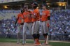 Baltimore Orioles' James McCann, center, celebrates with teammates after hitting a 3-run home run during the fifth inning of a baseball game against the Minnesota Twins, Sunday, Sept. 29, 2024, in Minneapolis. (AP Photo/Abbie Parr)