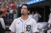 Detroit Tigers pitcher Kenta Maeda (18) walks in the dugout against the Chicago White Sox in the third inning of a baseball game, Sunday, Sept. 29, 2024, in Detroit. (AP Photo/Paul Sancya)