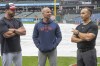 Cleveland Guardians manager Stephen Vogt, left, Houston Astros manager Joe Espada, center, listen to umpire Mark Wegner, right, as they discuss field conditions because of constant rain before a baseball game in Cleveland, Sunday, Sept. 29, 2024. (AP Photo/Phil Long)