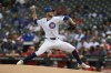 Chicago Cubs starter Caleb Kilian delivers a pitch during the first inning of a baseball game against the Cincinnati Reds in Chicago, Sunday, Sept. 29, 2024. (AP Photo/Paul Beaty)
